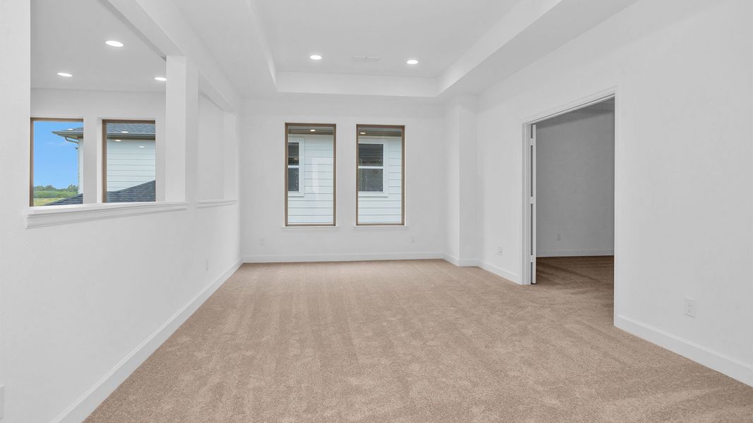 Spacious, unfurnished interior of a new home in Legacy Prairie at Katy Court, Katy (Image 13).