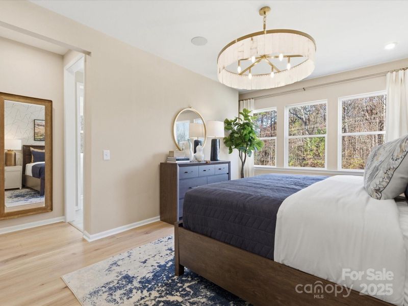 9' Ceilings and 8' Doorways at Primary Suite. *Model Photos | Actual Finishes, Structural Selections, and Orientation May Vary.