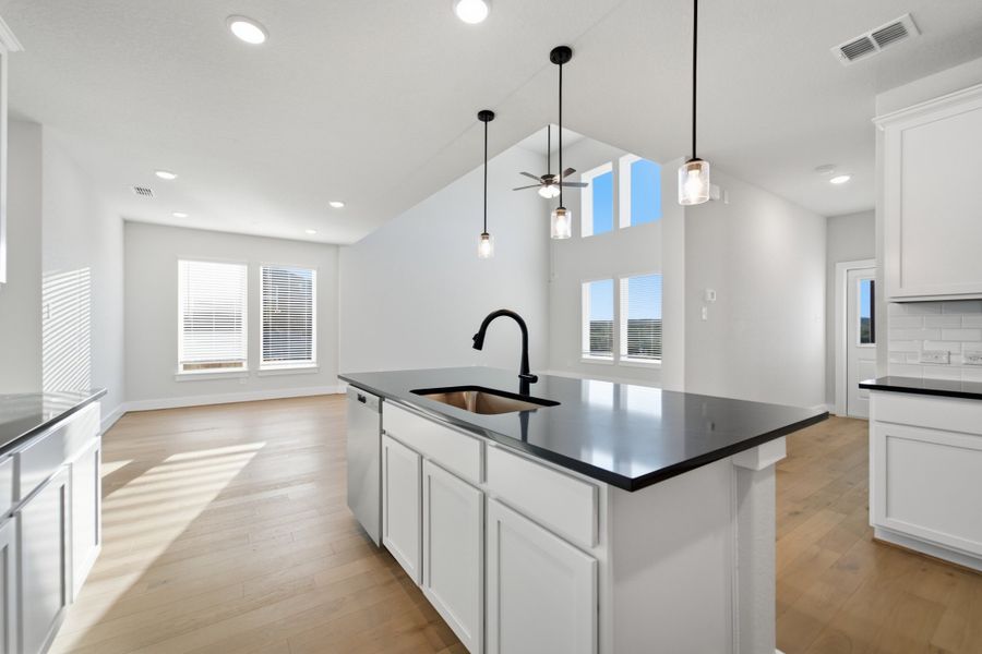 Furnished interior view inside a new home in The Woodlands at Medina Hills, Mico (Image 17).