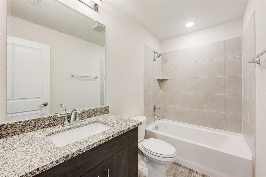 Furnished interior view inside a new home in Bear Creek Elements, Lavon (Image 14).