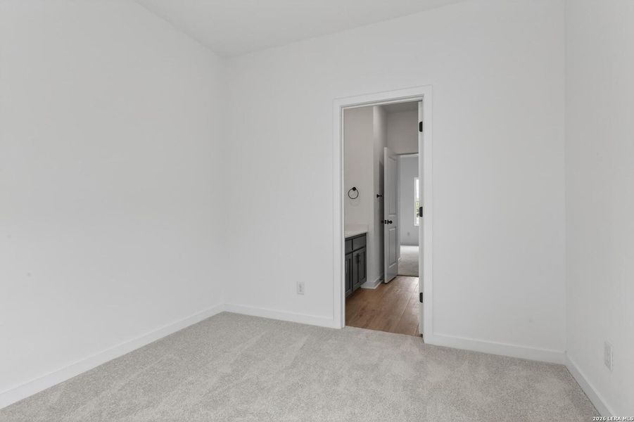 Spacious, unfurnished interior of a new home in Hennersby Hollow, San Antonio (Image 19).