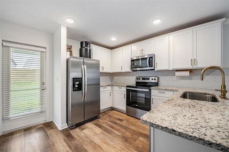 Furnished interior view inside a new home in Trilby Crossing, Brooksville (Image 6).