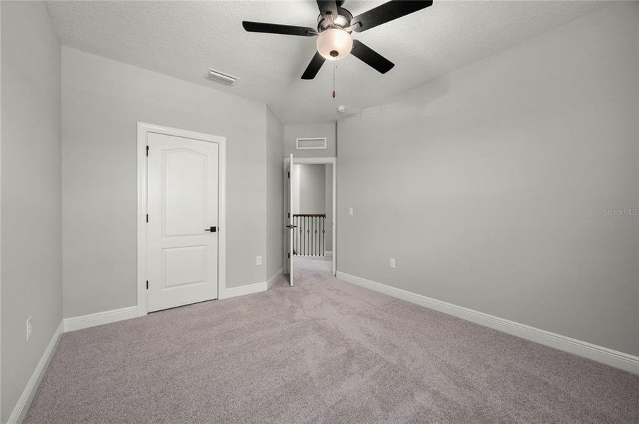 Spacious, unfurnished interior of a new home in Reunion Village, Kissimmee (Image 7). Spacious, unfurnished interior of a new home in Reunion Village, Kissimmee (Image 7).