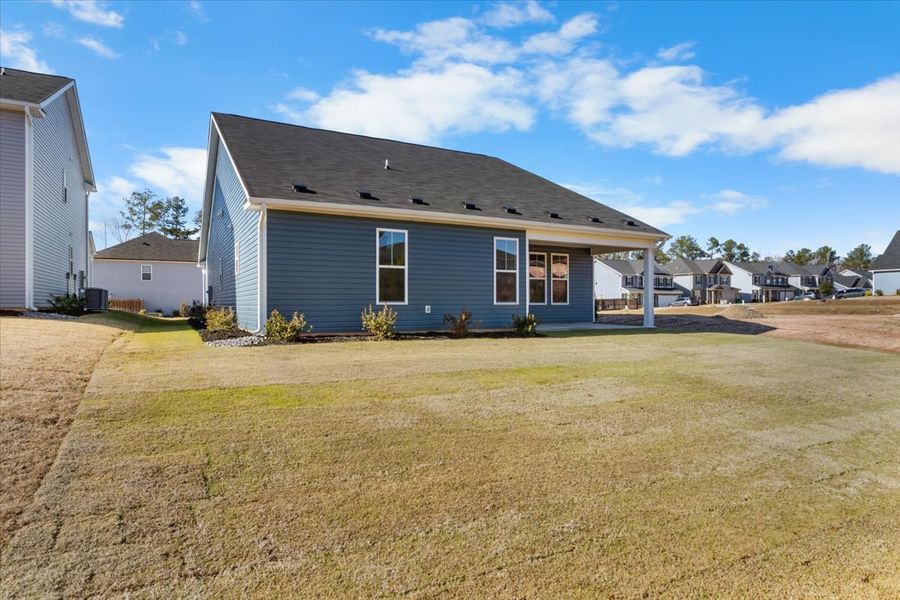 Exterior details and patio area of a home in Windsor, North Augusta (Image 23).