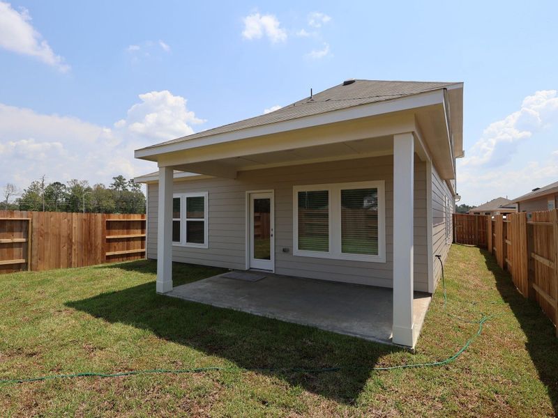 Front exterior of a new home in Indian Springs, Crosby, TX, highlighting curb appeal (Image 1).