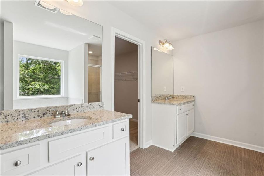 Furnished interior view inside a new home in The Hills at Cedar Creek, Winder (Image 5).
