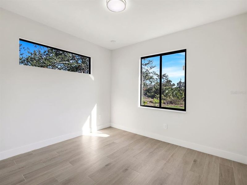 Spacious, unfurnished interior of a new home in , Port Charlotte (Image 10).
