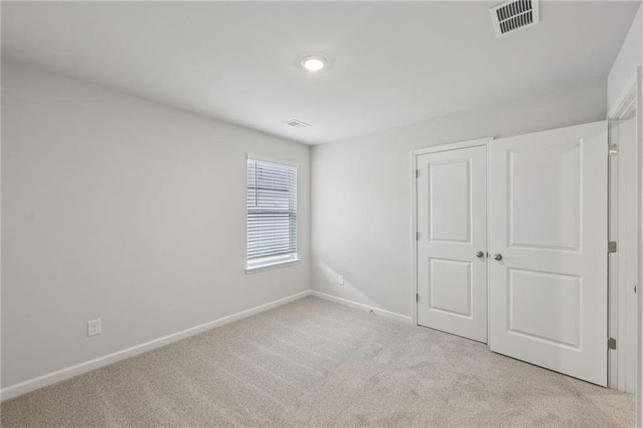 Spacious, unfurnished interior of a new home in Westmont Preserve, Powder Springs (Image 37).