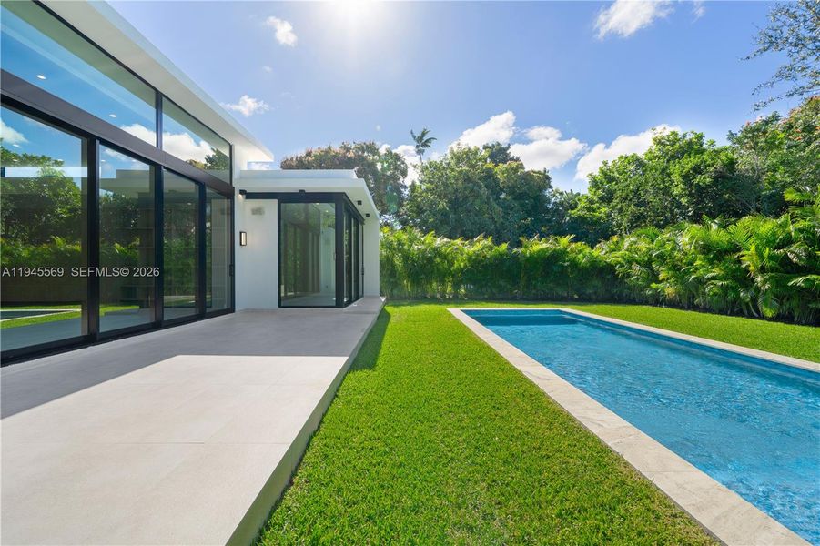 Exterior details and patio area of a home in , Biscayne Park (Image 16).