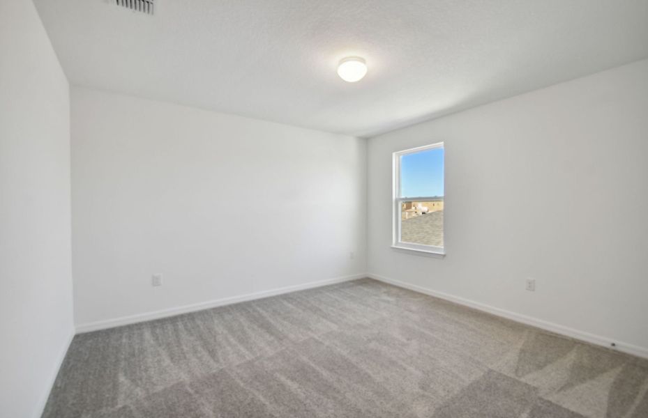 Spacious, unfurnished interior of a new home in Oakfield Lakes, Parrish (Image 14).