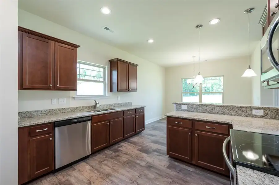 Representative furnished interior of a home built from the 1602-2 by Adams Homes in Ham Farm, La Grange (Image 6).