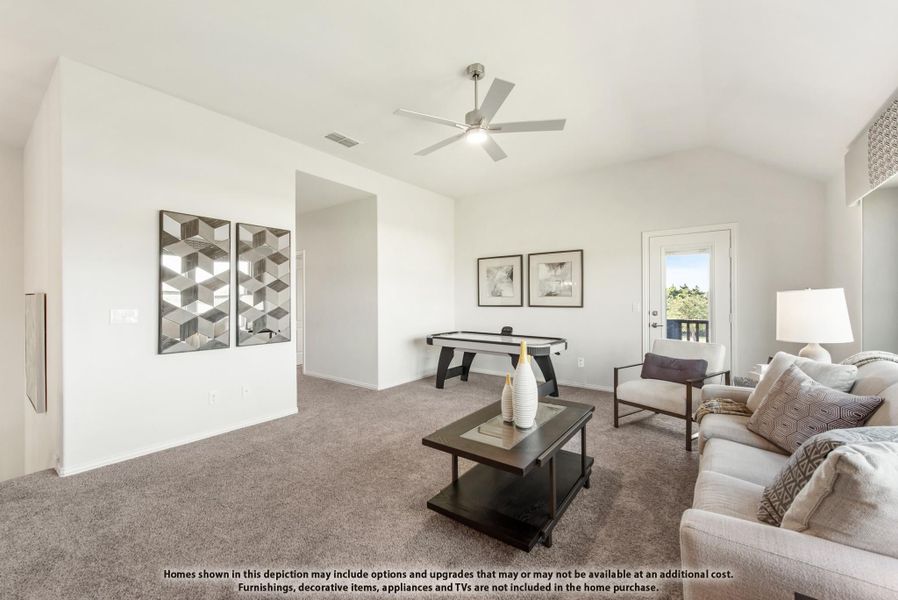 Bonus room with vaulted ceiling, ceiling fan, carpet, and air hockey table