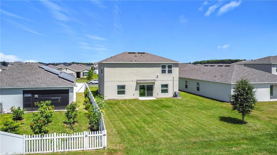 Front exterior of a new home in , Kissimmee, FL, highlighting curb appeal (Image 2).
