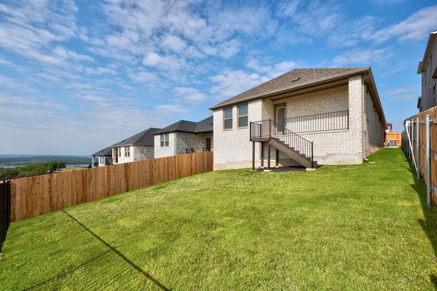 Front exterior of a new home in Lakeside at Tessera, Lago Vista, TX, highlighting curb appeal (Image 23).
