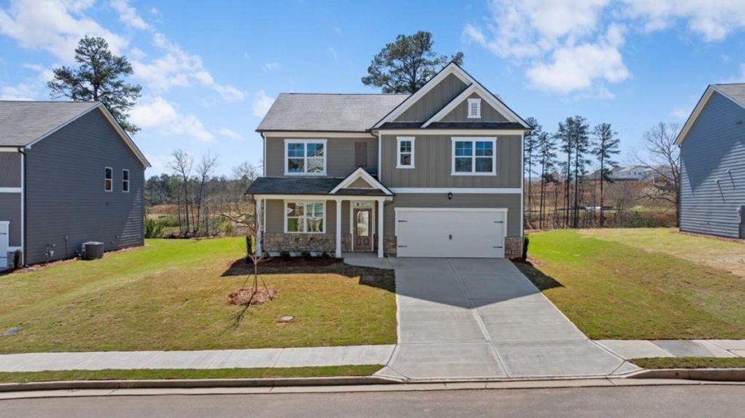 Front exterior of a new home in Thompson Ridge, Dallas, GA, highlighting curb appeal (Image 2).