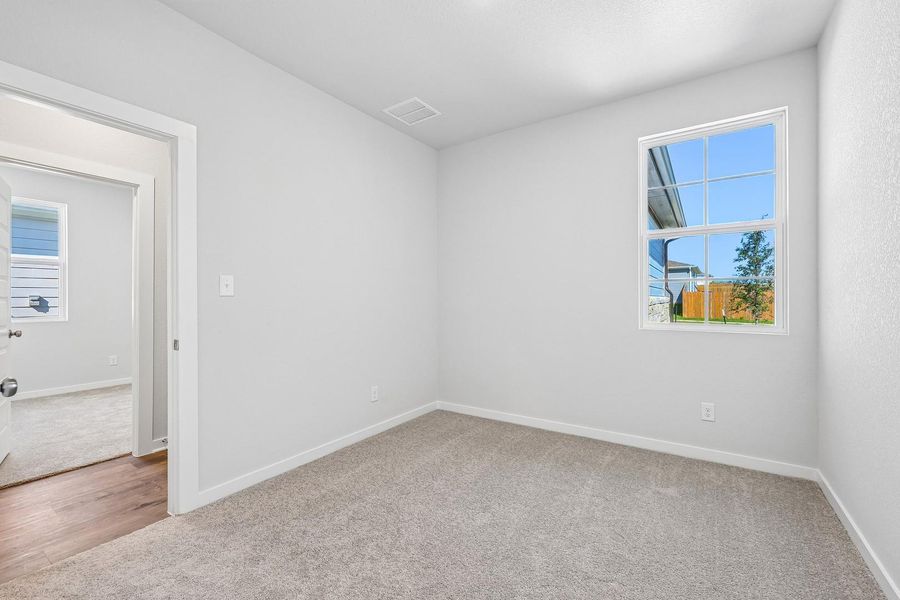 Spacious, unfurnished interior of a new home in Trinity Ranch, Elgin (Image 30).