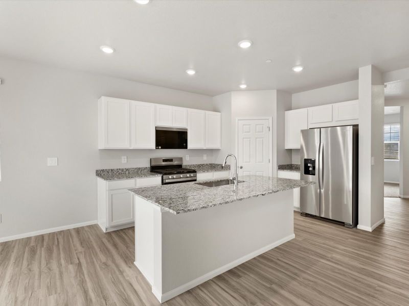 Furnished interior view inside a new home in Buffalo Highlands: The Flora Collection, Commerce City (Image 4).