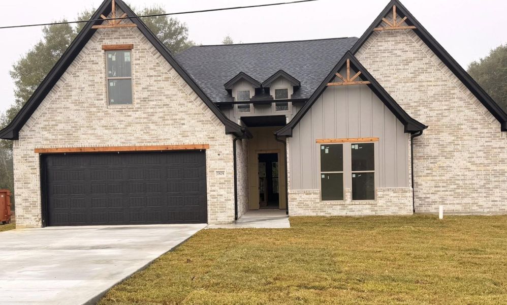Front exterior of a new home in , Beaumont, TX, highlighting curb appeal (Image 1).