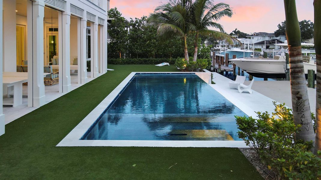 Front exterior of a new home in , North Palm Beach, FL, highlighting curb appeal (Image 24). Front exterior of a new home in , North Palm Beach, FL, highlighting curb appeal (Image 24).