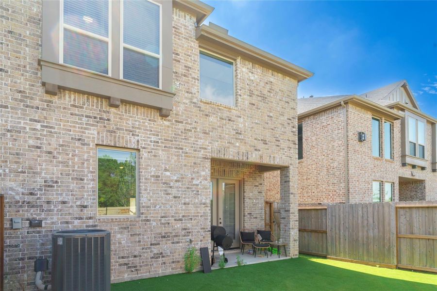 Exterior details and patio area of a home in , Fulshear (Image 3).