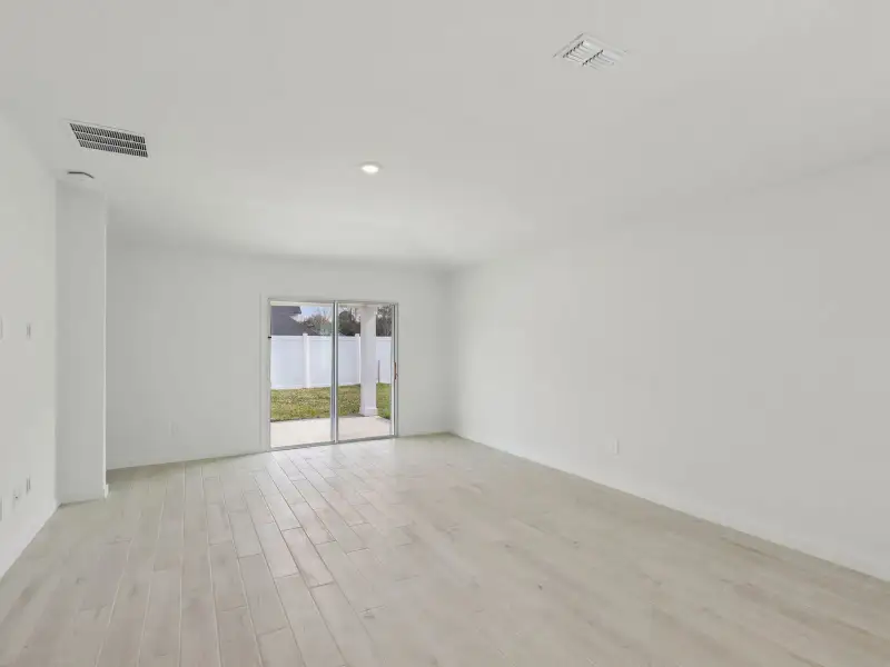 Spacious, unfurnished interior of a new home in Flagler Village - Signature Series, Palm Coast (Image 9).