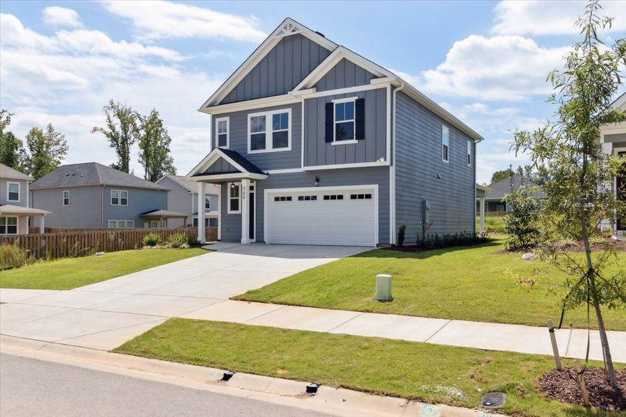 Front exterior of a new home in Tillery Park, Grovetown, GA, highlighting curb appeal (Image 15). Front exterior of a new home in Tillery Park, Grovetown, GA, highlighting curb appeal (Image 15).