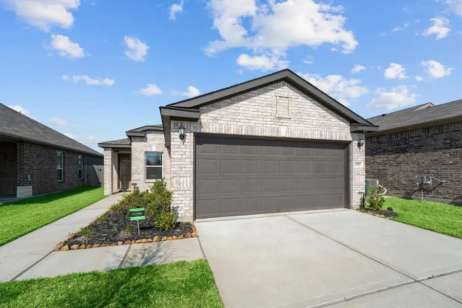 Front exterior of a new home in , Houston, TX, highlighting curb appeal (Image 1). Front exterior of a new home in , Houston, TX, highlighting curb appeal (Image 1).