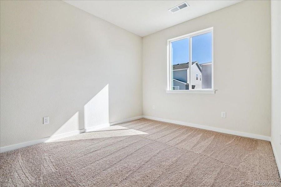 Spacious, unfurnished interior of a new home in Floret Collection at Alder Creek, Parker (Image 22).