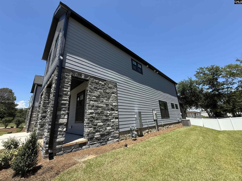 Front exterior of a new home in Dunbar Village, Cayce, SC, highlighting curb appeal (Image 27).
