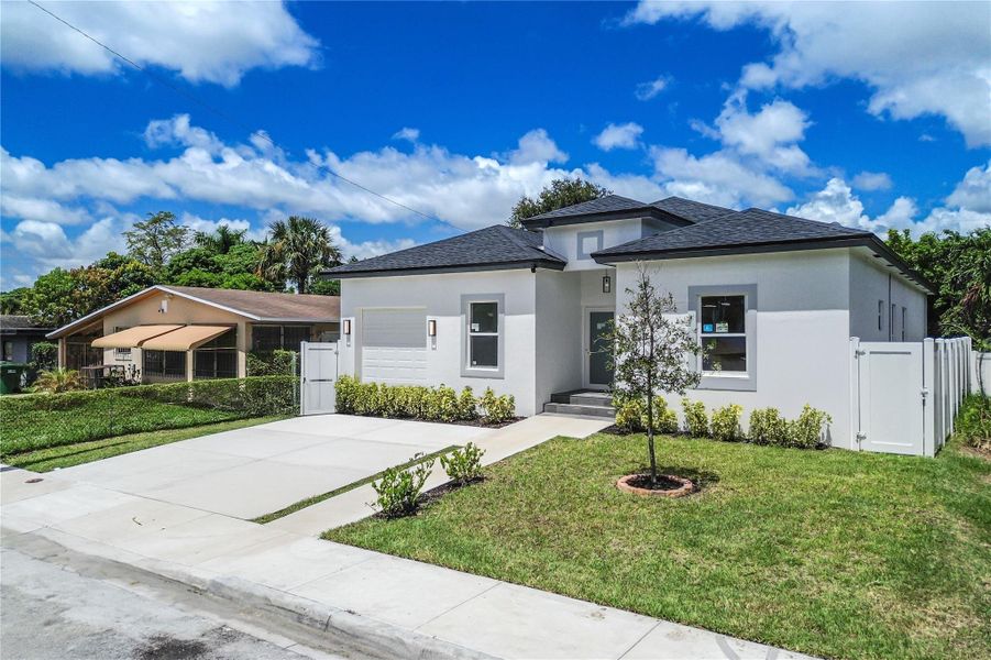 Front exterior of a new home in , Fort Lauderdale, FL, highlighting curb appeal (Image 2). Front exterior of a new home in , Fort Lauderdale, FL, highlighting curb appeal (Image 2).