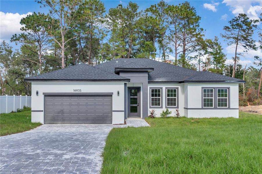 Front exterior of a new home in , Ocala, FL, highlighting curb appeal (Image 17). Front exterior of a new home in , Ocala, FL, highlighting curb appeal (Image 17).