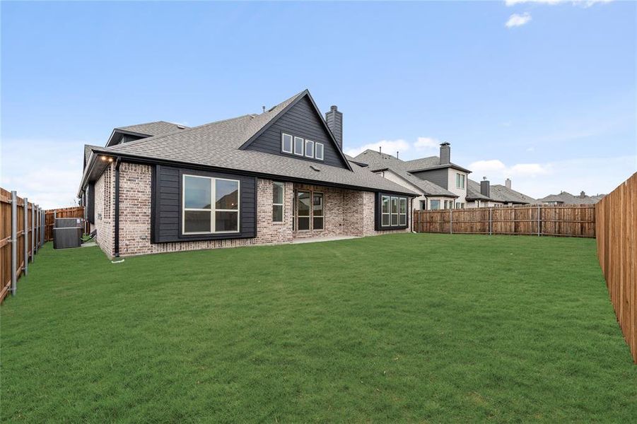 Exterior details and patio area of a home in Stone River Glen 60s, Royse City (Image 22).