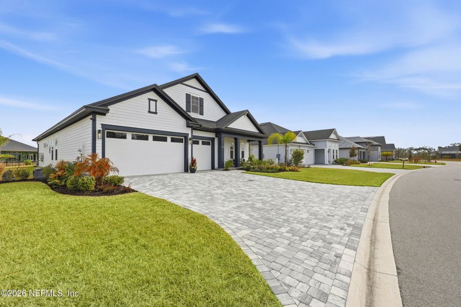 Front exterior of a new home in , St. Augustine, FL, highlighting curb appeal (Image 24).