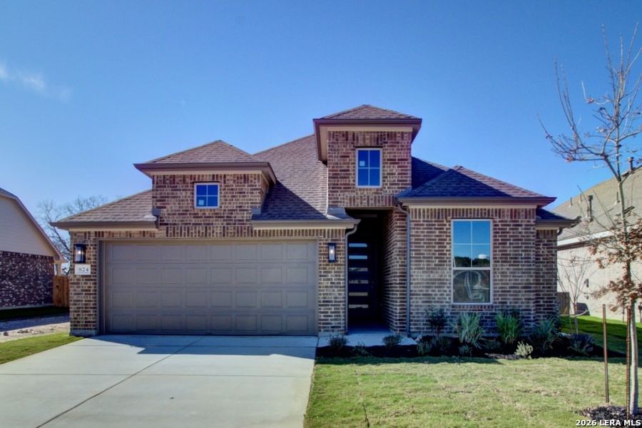 Front exterior of a new home in Prairie Green, Converse, TX, highlighting curb appeal (Image 1). Front exterior of a new home in Prairie Green, Converse, TX, highlighting curb appeal (Image 1).