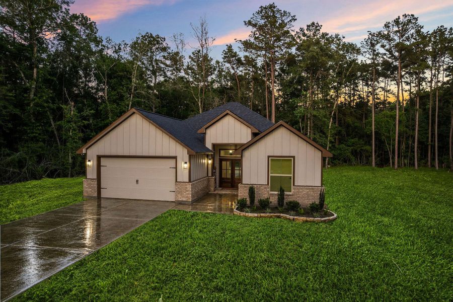 Front exterior of a new home in , Porter, TX, highlighting curb appeal (Image 24).