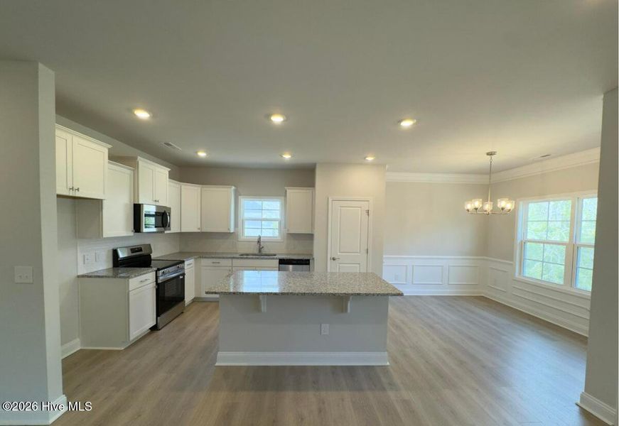 Furnished interior view inside a new home in River Village Square in River Landing, Wallace (Image 3).
