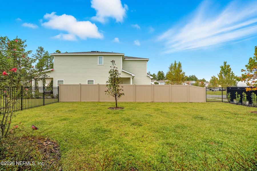 Front exterior of a new home in , St. Augustine, FL, highlighting curb appeal (Image 24).