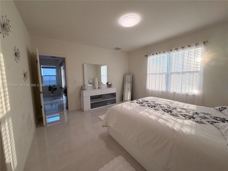 Furnished interior view inside a new home in , Port St. Lucie (Image 34).