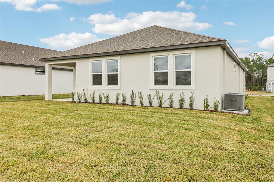 Exterior details and patio area of a home in Legends Preserve - Signature Series, Daytona Beach (Image 20).