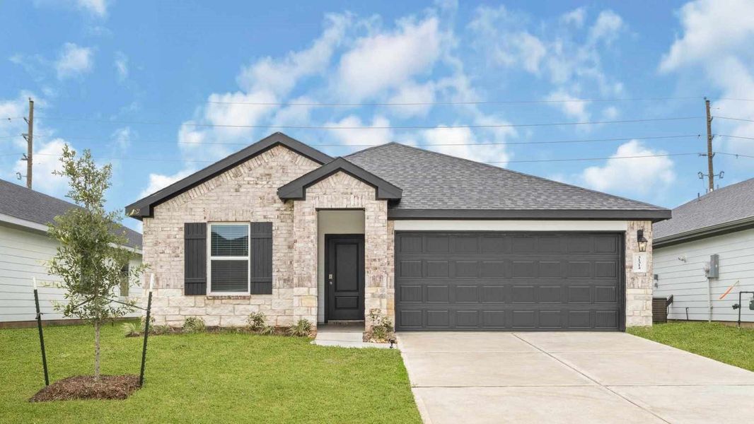 Front exterior of a new home in Tamarron, Fulshear, TX, highlighting curb appeal (Image 2). Front exterior of a new home in Tamarron, Fulshear, TX, highlighting curb appeal (Image 2).