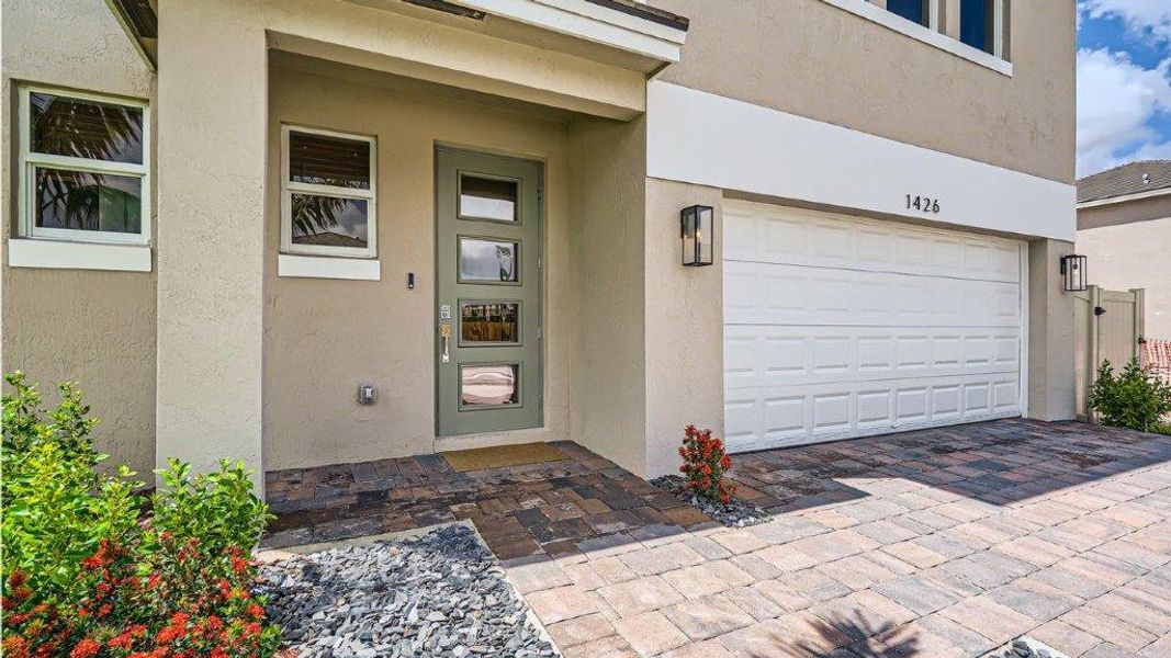 Representative exterior photo of a completed home built from the Grandcourt by D.R. Horton in Parker Pointe, Homestead, FL (Image 20).