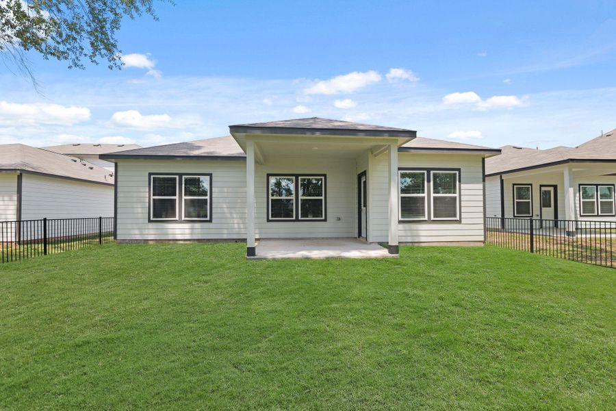 Front exterior of a new home in Lakes at Crockett Martin, Conroe, TX, highlighting curb appeal (Image 17).