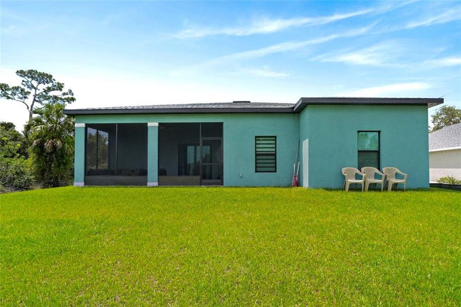 Exterior details and patio area of a home in , Port Charlotte (Image 32).