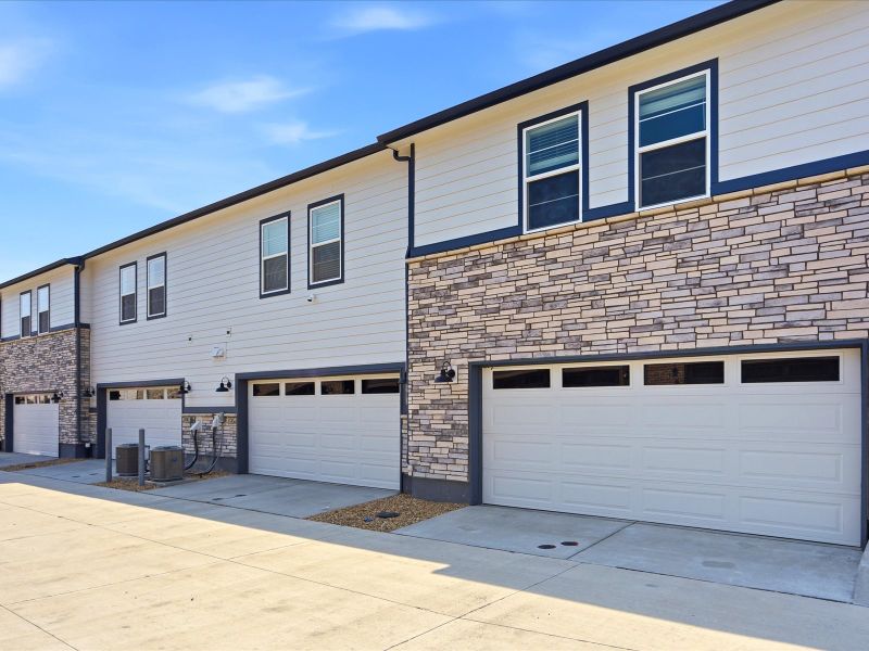 Exterior details and patio area of a home in Skyview at High Point, Aurora (Image 3).