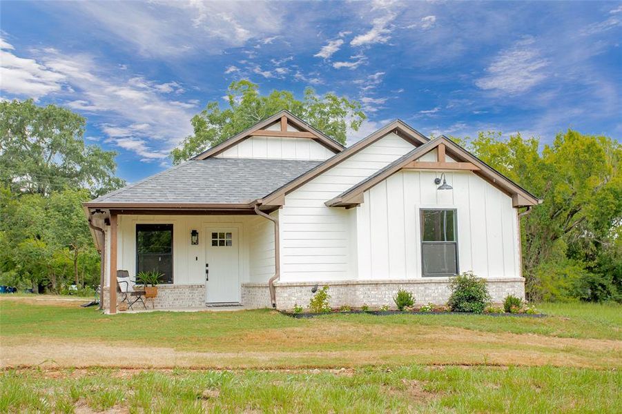 Front exterior of a new home in , Troup, TX, highlighting curb appeal (Image 24). Front exterior of a new home in , Troup, TX, highlighting curb appeal (Image 24).