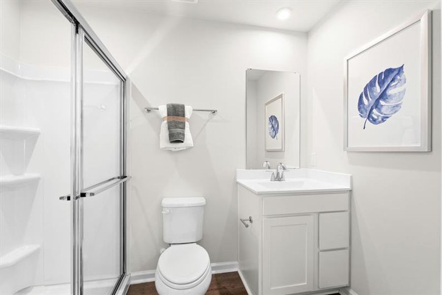 Representative furnished interior of a home built from the Ellis by Ryan Homes in Middle Creek Village Coastal Cottages & Villas, Bolivia (Image 19).