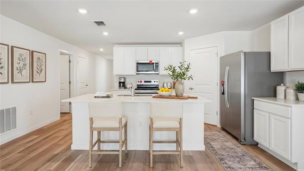 Furnished interior view inside a new home in Sunset Hills, Summerfield (Image 3).