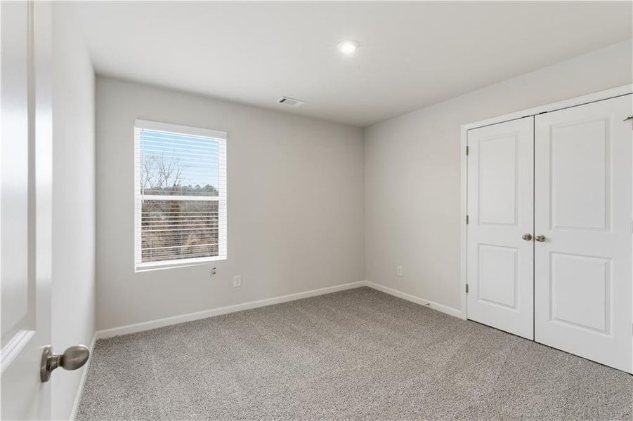 Spacious, unfurnished interior of a new home in The Reserve at Chapel Hill Phase II, Douglasville (Image 27).