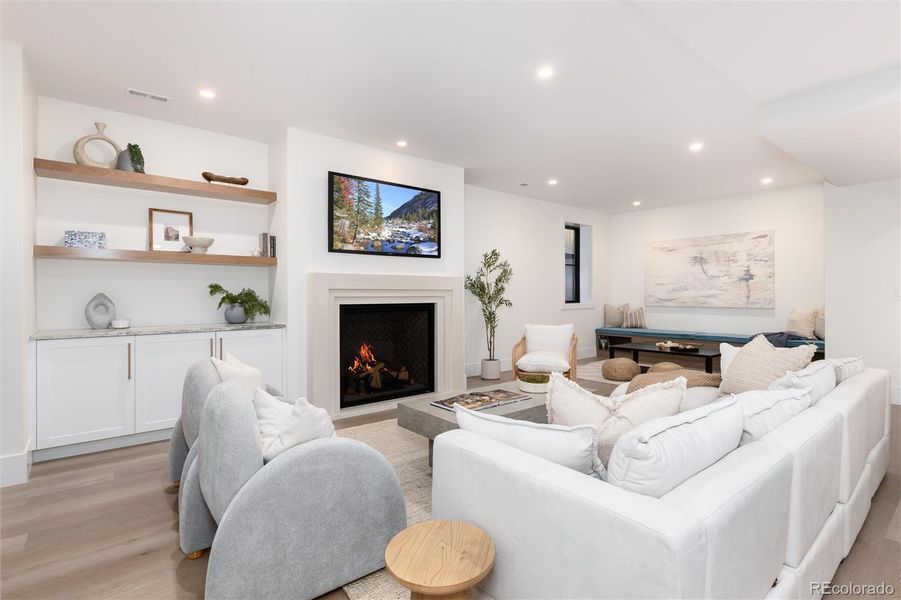 Custom built ins and caststone fireplace Custom built ins and caststone fireplace