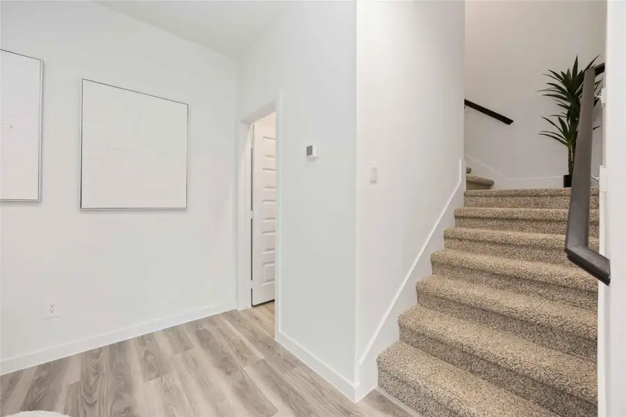 Spacious, unfurnished interior of a new home in Grand West, Houston (Image 17).